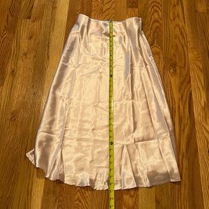 XS midi satin like skirt NWOT material content not known probably polyester